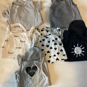 6 black and white Carter onesies